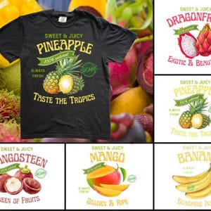 May include: Black t-shirt with a pineapple graphic. The text reads "Sweet & Juicy Pineapple, 100% natural, Always Fresh, Taste the Tropics." Additional graphics include a pineapple and a green banner. Other graphics include dragonfruit, mango, mangosteen, and banana.