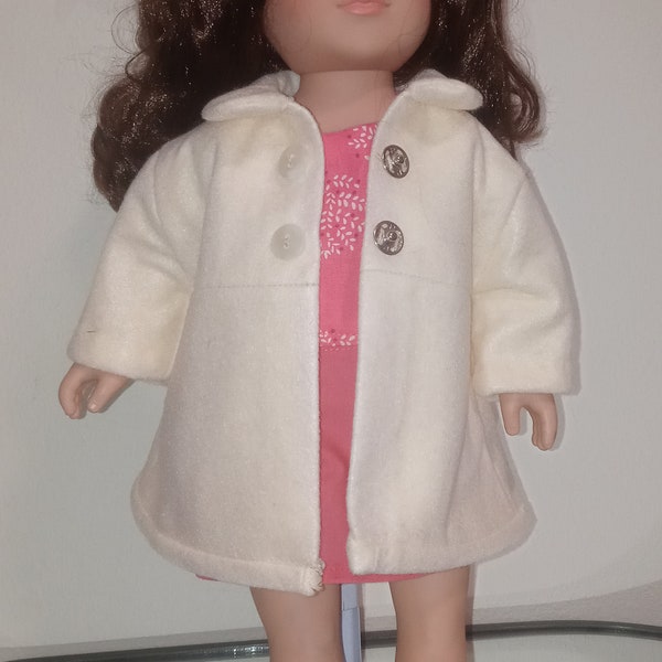 Cream colored felt coat with yellow lining. Fits 18" dolls, American girl, my life, generation dolls. Great gift for little girls.