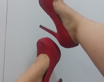 Photos of red high heels feet