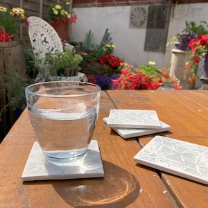 Four Watery Marble Coasters  | Unique Marble carvings | Coffee Table Coaster Set | Bespoke and Unique | Marble Design Coaster