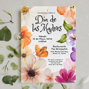 May include: A watercolor invitation with floral designs and a butterfly. The invitation is for a Mother's Day celebration on Saturday, May 10, 2025 at 11:00 am at The Briarpatch restaurant. The text reads "D&iacute;a de las Madres".