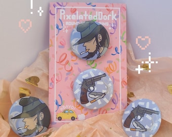 May include: Three round pins with a pink background. The pins feature a cartoon character with a hat and a cigarette, a revolver with a cigarette and an ashtray, and a revolver with a cigarette and an ashtray. The text "PixelatedDork" is on the background.