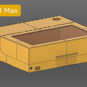 Könnte beinhalten: Eine rechteckige, beige Box mit einem transparenten Fenster und einem kleinen Griff. Die Box hat eine kreisförmige Öffnung oben und den Text "K1 Max" in einem gelben Rechteck.