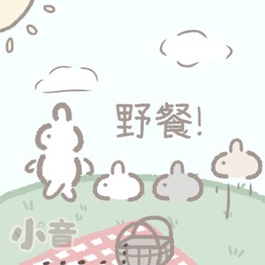 May include: A cartoon illustration of a picnic with three white rabbits, a basket, and a red and white checked blanket. The text "Let's eat!" is written in Chinese characters.