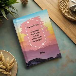 May include: A pink and orange sunset landscape with a quote from Proverbs 15:1 KJV: "A soft answer turneth away wrath: but grievous words stir up anger." The name Jason is printed below the quote.