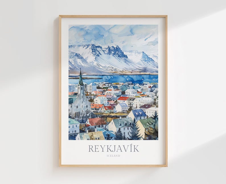 May include: A watercolor painting of Reykjavik, Iceland. The painting shows a cityscape with a church steeple, colorful buildings, and snow-capped mountains in the background.