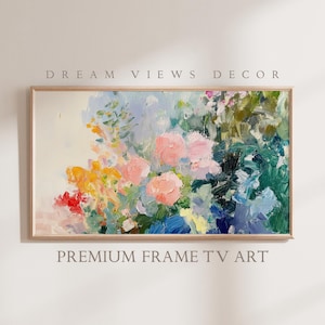 May include: Abstract painting featuring a colourful floral bouquet with pink, yellow, blue, and green hues. The painting is framed in a light wood frame.