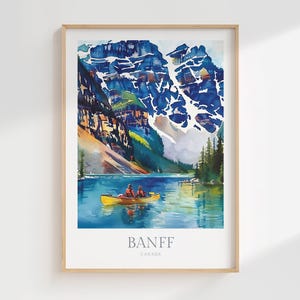 May include: A watercolor painting of a mountain lake scene in Banff, Canada. Two people are paddling a yellow canoe in the turquoise water. The mountains in the background are snow-capped and have a blue and green color scheme.