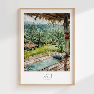May include: A watercolor painting of a view from a wooden deck in Bali, Indonesia. The painting shows a lush green rice paddy with a thatched roof hut in the background. A blue yoga mat is laid out on the deck, and a bottle of water is sitting on the floor.