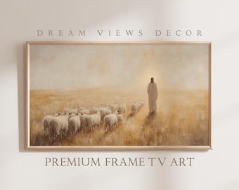 May include: Framed artwork depicting a figure in white robes with a bright light behind them, leading a flock of sheep across a field. The words "DREAM VIEWS DECOR" and "PREMIUM FRAME TV ART" are printed on the image.