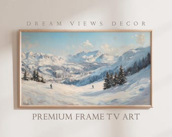 May include: A framed painting of a snowy mountain landscape with skiers in the foreground. The painting is in a light wood frame and has a blue sky with white clouds.