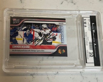 Connor Bedard 2023 Topps Now #70 " The Michigan Goal" Rookie RC Prospect Facsimile Autographed Rare Graded Chicago Blackhawks Hockey Card