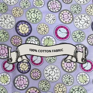 May include: A lavender-colored cotton fabric featuring a repeating pattern of vintage-style clocks in various colors. The clocks have Roman numerals and hands pointing to different times. A banner across the fabric reads "100% COTTON FABRIC."