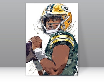 May include: A watercolor illustration of a football player wearing a green and gold uniform and helmet. The player is holding a football and looking to the side. The background is a white splatter pattern.