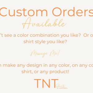May include: Cream-colored graphic with orange and gold text. The text says "Custom Orders Available" and "Message Me". The bottom of the graphic has the text "TNT Shirts & Apparel".