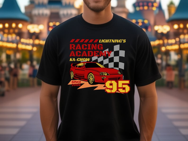 May include: Black t-shirt with a red and yellow graphic of a red sports car with the text "Lightning's Racing Academy", "Ka-Chow", and "95".