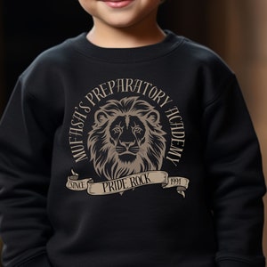 May include: Black sweatshirt with a gold lion graphic and the text "Mufasa's Preparatory Academy" and "Pride Rock" on a banner.
