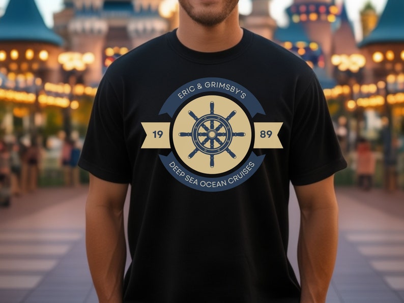 May include: A black t-shirt with a navy blue and yellow logo featuring a ship's wheel and the text "Eric & Grimsby's Deep Sea Ocean Cruises 1989".