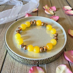 Yellow & Copper stretch bracelet with gold accents; yellow dolomite Jasper