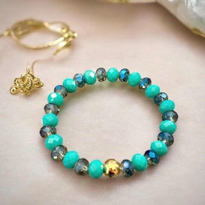 Teal and blue iridescent glass beads with 14k heavy gold plated accent bead, sparkly, shimmery