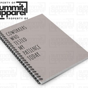 May include: A light grey spiral-bound notebook with the text "COWORKERS WHO TESTED MY PATIENCE TODAY" printed in black. The notebook is from Summit Apparel.