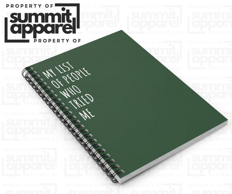May include: A dark green spiral-bound notebook with the text "MY LIST OF PEOPLE WHO TRIED ME" in white. The notebook is from Summit Apparel.