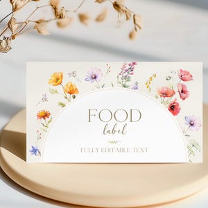 May include: A white card with a floral border and the text "FOOD label" in gold lettering. The text "FULLY EDITABLE TEXT" is also included on the card.