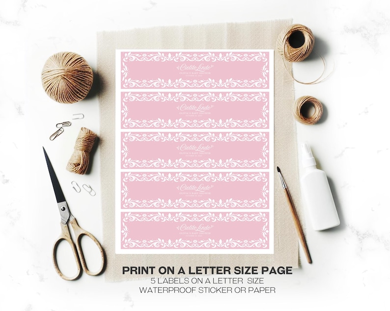 Cielito Lindo Baby Shower Water Bottle Label in pastel pink featuring papel picado and Pink Talavera patterns. A festive Mexican-themed party favor for girl baby showers. Editable in Canva, perfect for adding charm to your Cielito Lindo celebration.