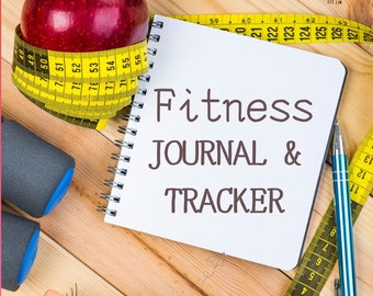 May include: A white notebook with the text "Fitness JOURNAL & TRACKER" on a wooden surface. There is a red apple, a yellow measuring tape, a blue water bottle, a blue pen, and a gray and blue dumbbell.