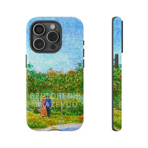May include: A phone case featuring a painting of a couple strolling through a field of flowers. The sky is blue and the flowers are red, yellow, and green. The text "RESTORED BY MAZEVOO" is visible in the bottom centre of the case.