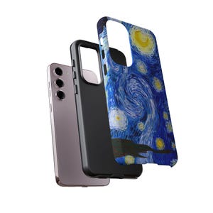 May include: A phone case with a design inspired by Van Gogh's "Starry Night" painting. The case is predominantly blue with swirling brushstrokes, yellow stars, and a dark foreground. A black phone case and a lavender phone are also visible.