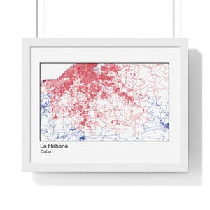 May include: A framed print featuring a map of La Habana, Cuba, with red and blue lines depicting roads and infrastructure. The map is set against a white background, within a white frame. The text "La Habana Cuba" is at the bottom.