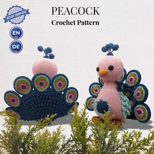 May include: A crochet pattern for a peacock, featuring text that reads PEACOCK Crochet Pattern. The image displays two handmade crochet peacock figures with light pink heads and bodies, dark blue tail feathers with pink and green accents.