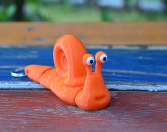 Llavero flexible de caracol, juguete articulado impreso en 3D, bonito caracol que se mueve, regalo único para niños, amantes de la naturaleza y coleccionistas.