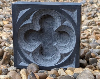 Tracery quatrefoil hand carved into Welsh slate.