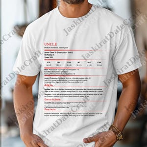 May include: White t-shirt with the word "UNCLE" in red text, along with game statistics. The shirt features a detailed character sheet with various attributes and abilities, perfect for tabletop gaming enthusiasts.