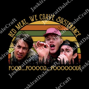 May include: Black graphic tee featuring three people with the text "RED MEAT, WE CRAVE SUSTENANCE" above them. Below the people is the text "FOOD...FOOOOD...FOOOOOOD!". The design has a retro sunset colour scheme.