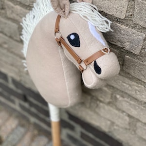 Fantastic foal fjord hobby horse including luxury halter and stick.