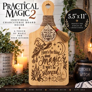 May include: A light-coloured wooden charcuterie board measuring 14 cm by 28 cm, featuring a laser-engraved design of a witch hat, candles, a cat, and the text: Here's the thing about Magic. It won't be silenced. Includes a small hanging tag.