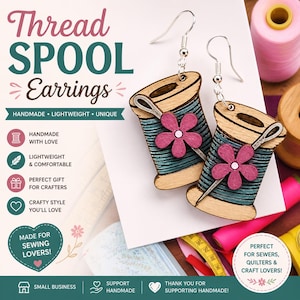May include: Wooden thread spool earrings with a pink flower accent and a silver needle. The earrings are handmade and lightweight. The text on the image says "Thread Spool Earrings" and "Made for Sewing Lovers!"