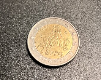 Pièce de 2 euros avec un « S » sur une étoile