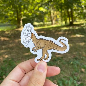 Dinosaur sticker with flower head, daisy, Daisy flower