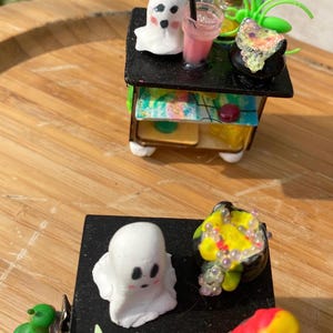 option 2 in back with mini window & option 3 in front with candle mounted on the side
