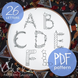 Alfabeto de Natal, Conjunto de letras para bordado à mão. Padrão de bordado à mão com coisas de feriado. Monograma de Natal, arte moderna de bastidor