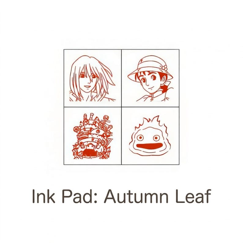 May include: Square ink pad with four red illustrations of characters from a Japanese animated film. The text "Ink Pad: Autumn Leaf" is printed below the illustrations. The illustrations include a person with long hair, a person wearing a hat, a mechanical structure, and a round creature.