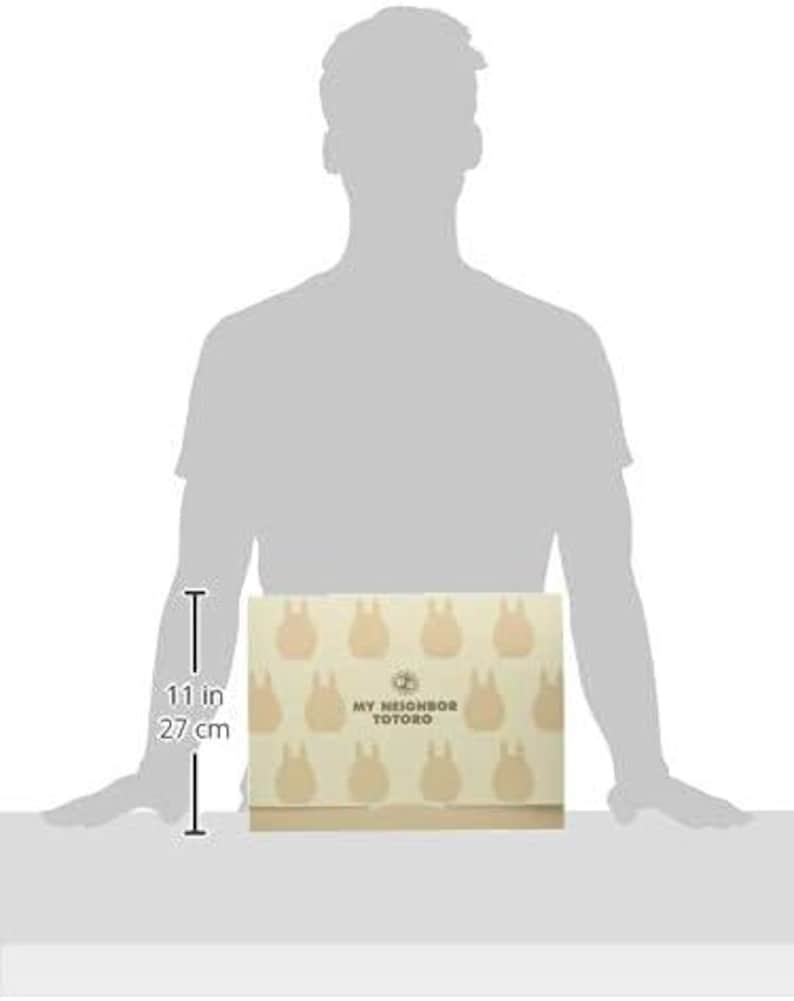 May include: A beige box with a repeating pattern of light brown Totoro characters. The box is 11 inches (27 cm) tall and features the text "MY NEIGHBOR TOTORO".