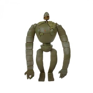 Peut inclure: Figurine de robot vert olive avec des membres segment&eacute;s et un torse bulbeux. La figurine a une petite t&ecirc;te et une touffe de feuillage sur l'&eacute;paule. Le robot tient une petite gemme rose dans sa main.