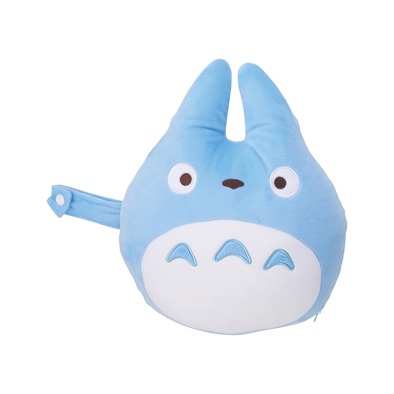 May include: A light blue plush toy shaped like a cartoon character with large ears, brown eyes, and a white belly. The toy has a small, light blue strap attached to its side.