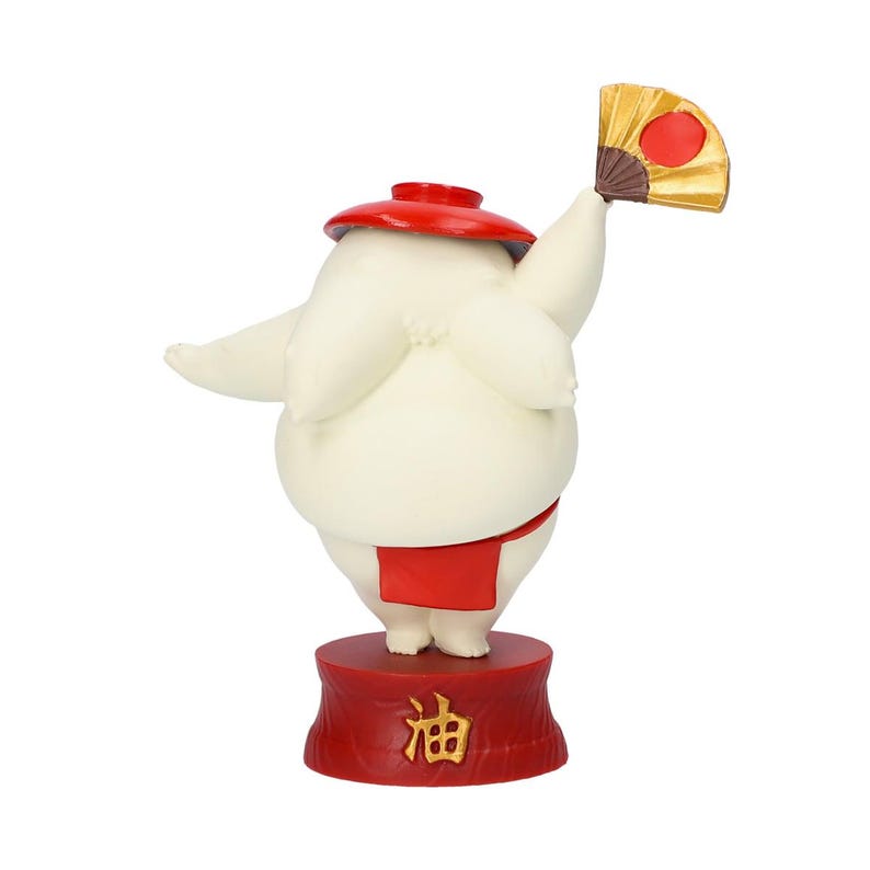 Peut inclure: Figurine d'un lutteur de sumo avec un chapeau et un pagne rouges, tenant un &eacute;ventail dor&eacute; et rouge. La figurine est blanche avec une base rouge avec des caract&egrave;res japonais.