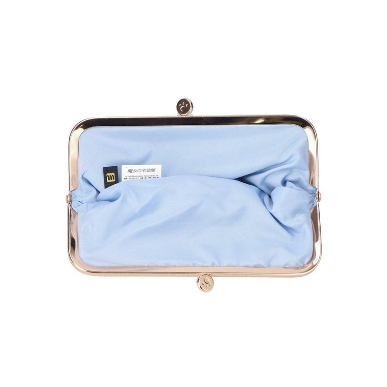 May include: A light blue fabric lined clutch purse with a gold metal frame and a small label inside that reads "Made in Japan".